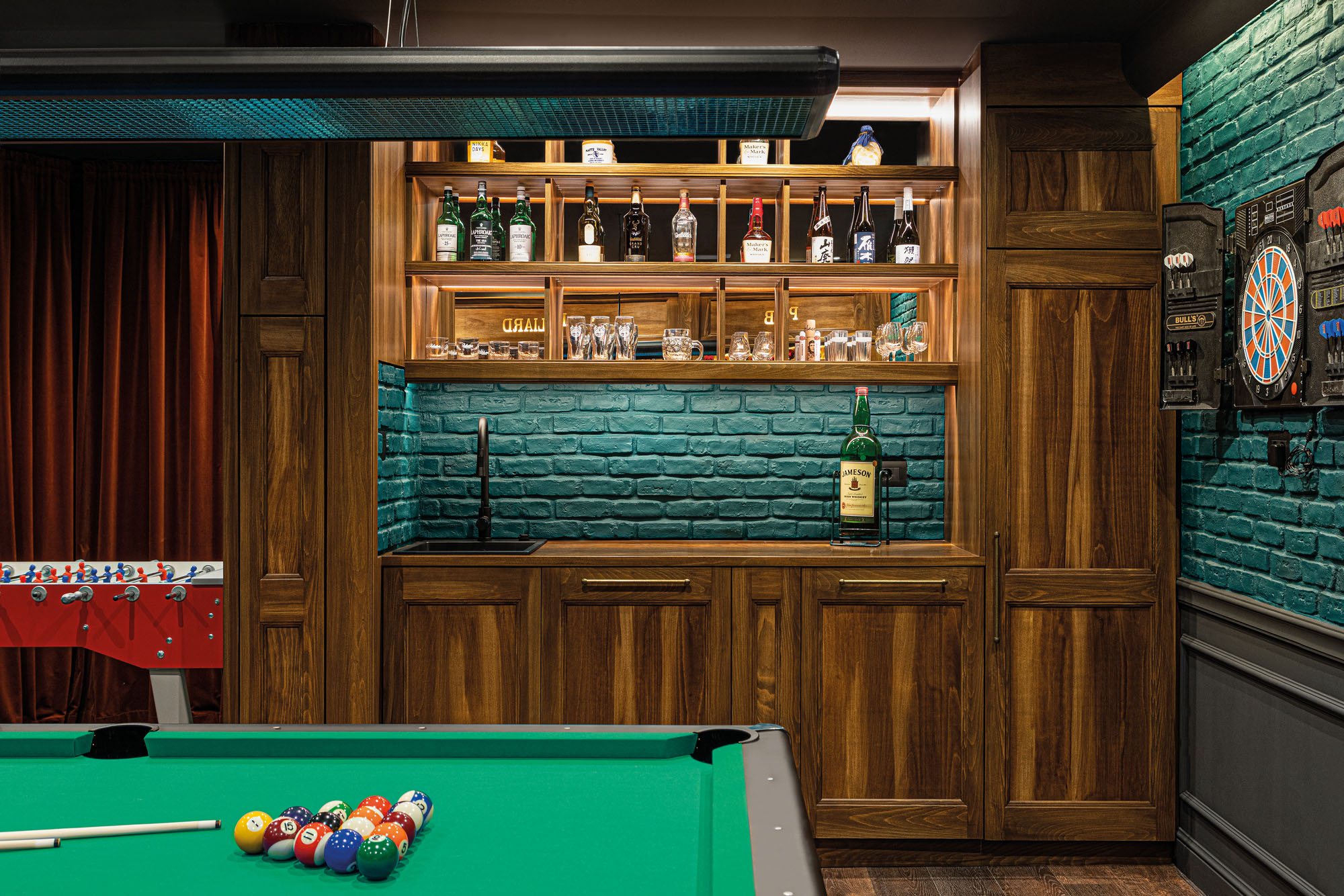 Home bar detail with custom shelving and spirits collection